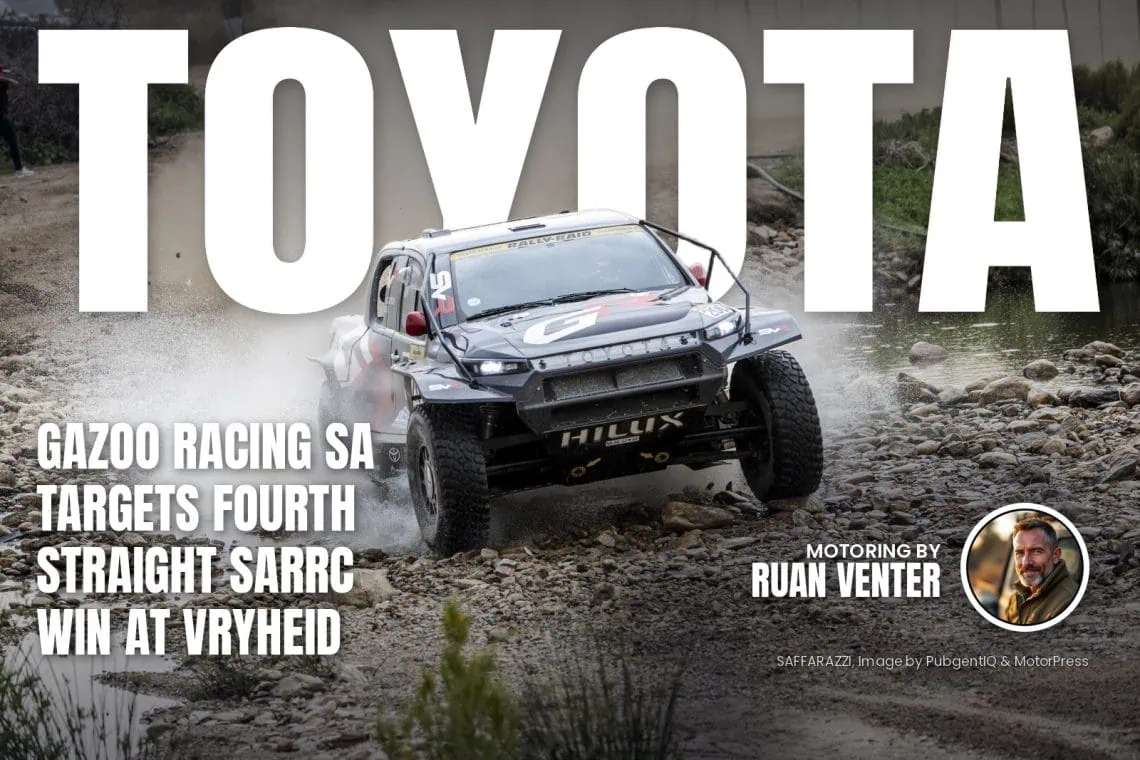 Toyota GR Hilux IMT EVO splashing through rocky river crossing