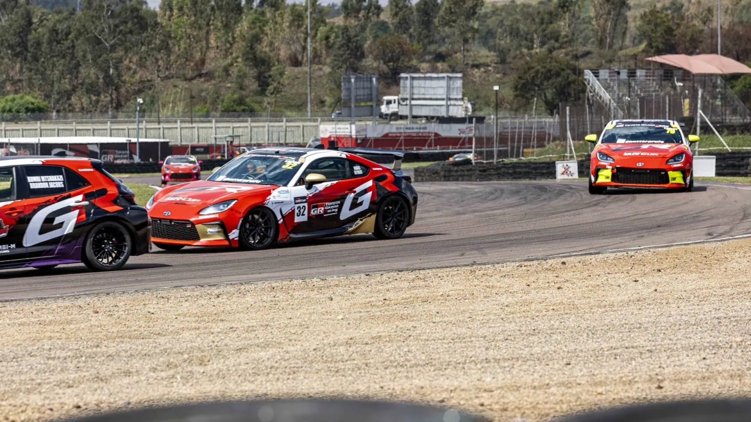 GR86 number 32 cornering - Saffarazzi Toyota GR86 number 32 in a GR Cup race.