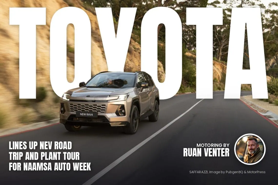 Silver Toyota RAV4 driving on a winding mountain road beside a rocky cliff and trees in the background.