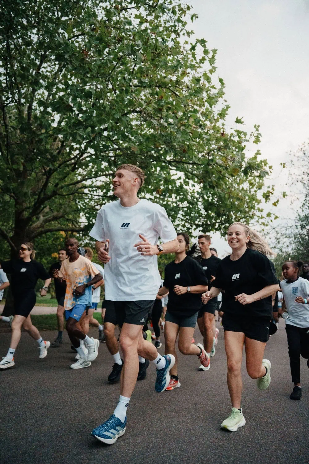 URUNN group running session - Saffarazzi URUNN group run in a London park.